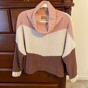 Lovely pink, cream and brown knit sweater.